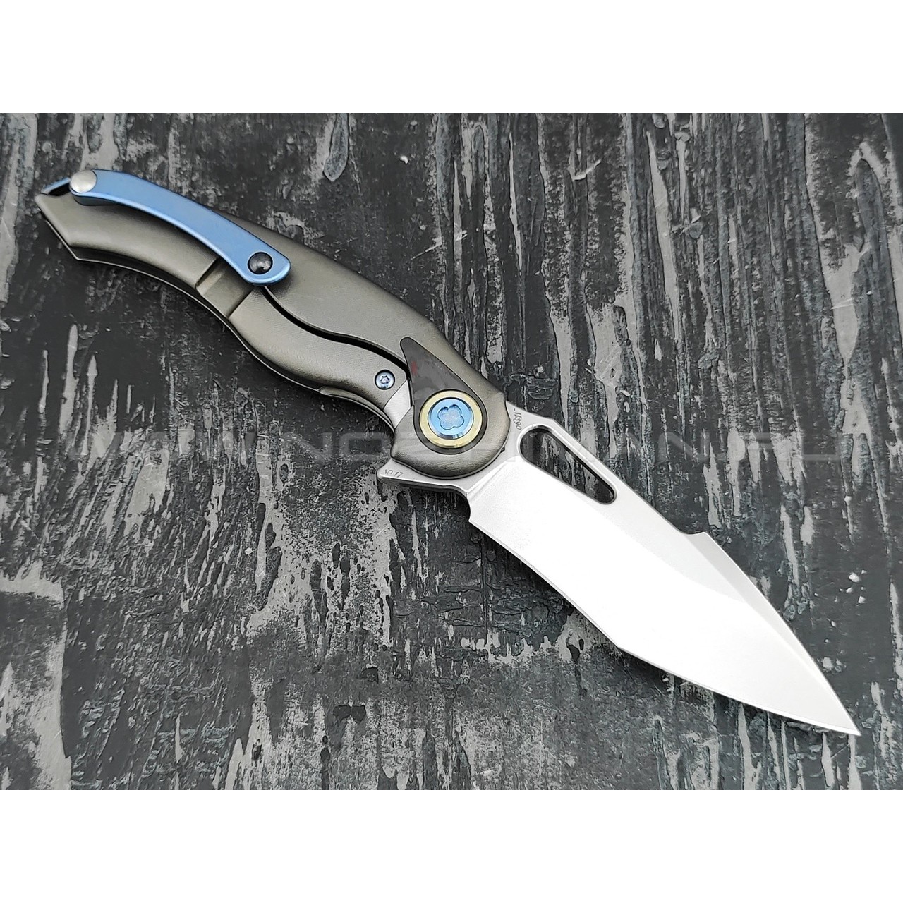 Нож Rike Knife Unicorn-RCF RK12165-1 сталь M390, рукоять титан и carbon