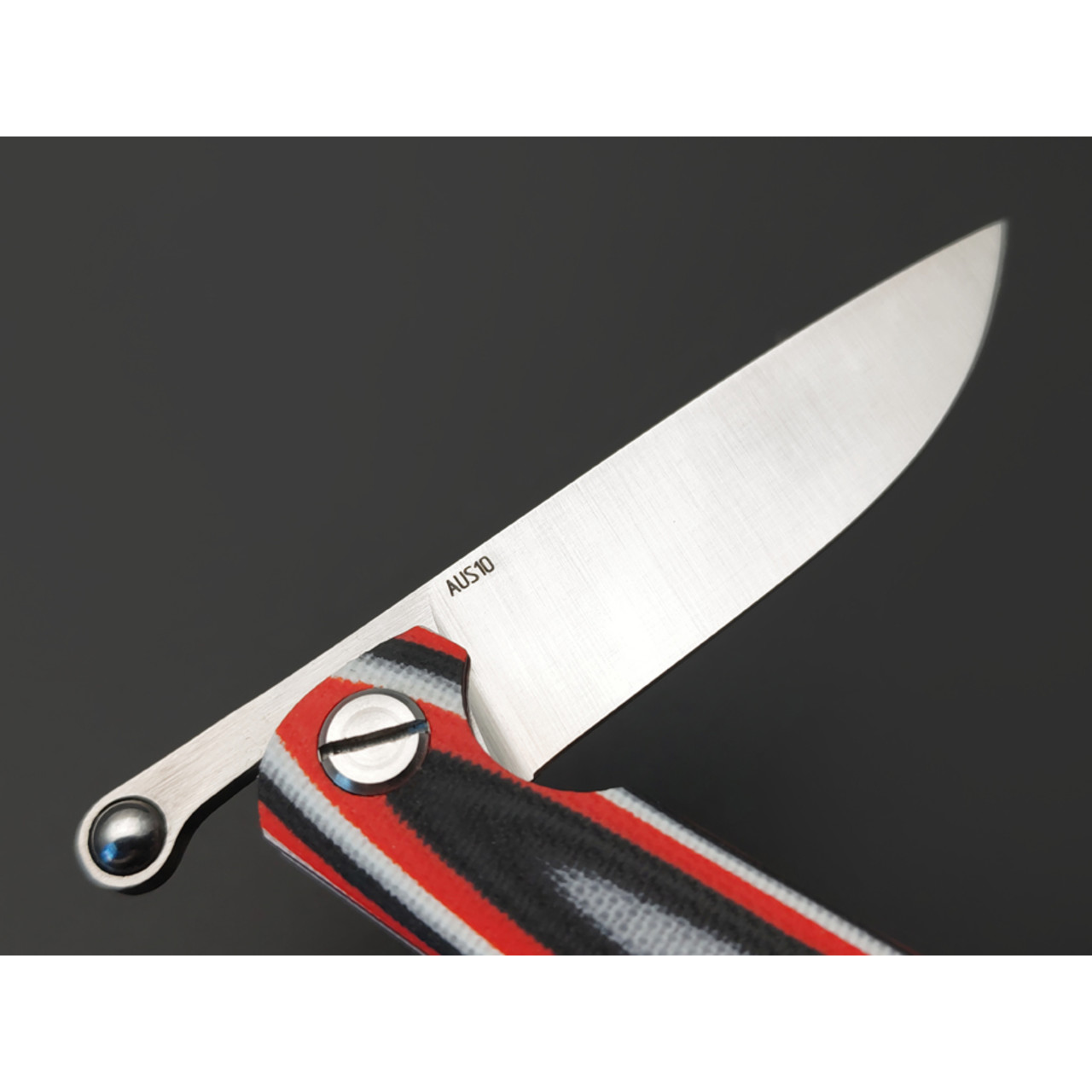 Saro нож складной фрикционный Микрос сталь Aus-10 satin, рукоять G10 red-white & black