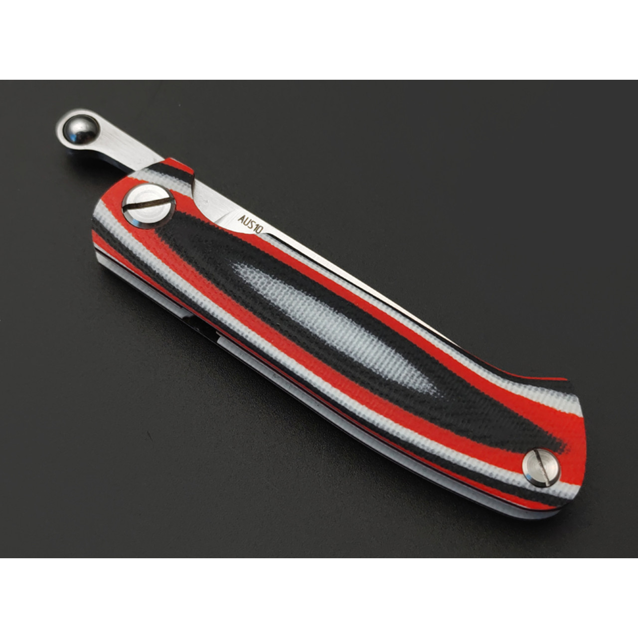 Saro нож складной фрикционный Микрос сталь Aus-10 satin, рукоять G10 red-white & black