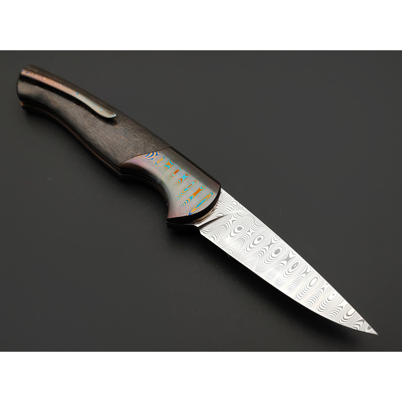 Заур Мамишев нож складной М-03 сталь ДамаКС-Супер Elmax, рукоять Carbon fiber gold, дамаск Decorum, титан