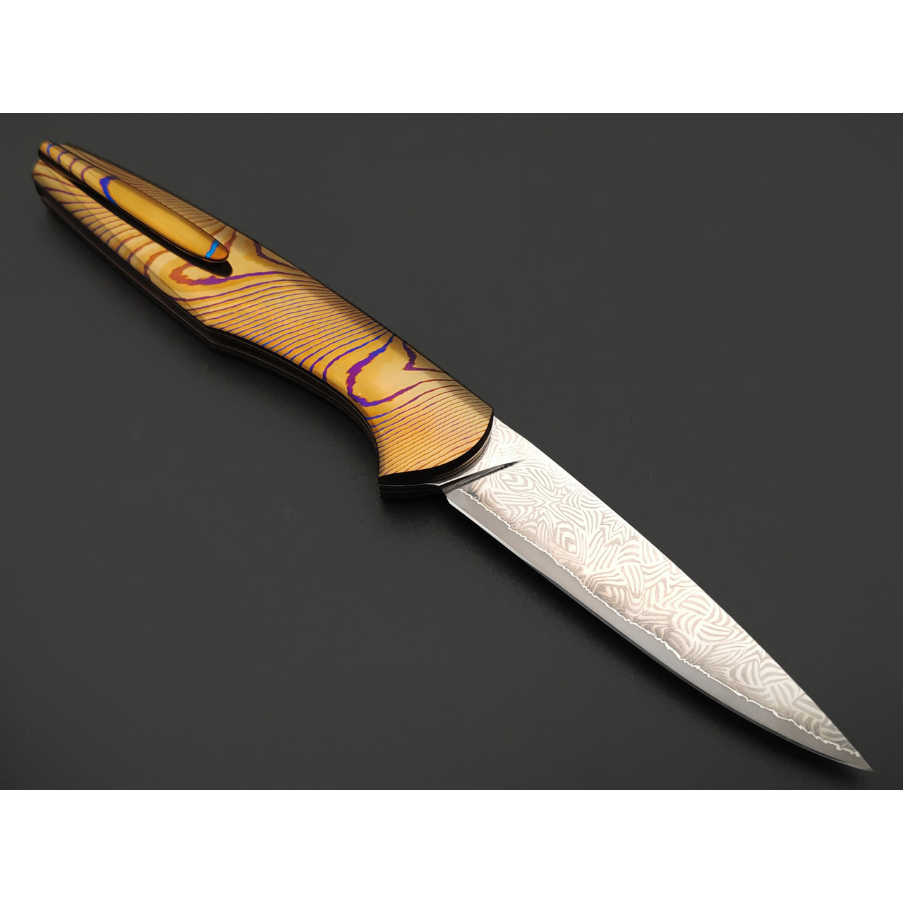 Заур Мамишев нож складной М-04 сталь ламинат PMD60, рукоять Timascus Ponomarev Forge, титан