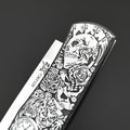 X Тату нож складной Модель X2 "Король Азарта", сталь Aus10Co, рукоять AISI420 с гравировкой X Тату нож складной Модель X2 "Король Азарта", сталь Aus10Co, рукоять AISI420 с гравировкой