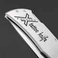 X Тату нож складной Модель X2 "Ход Конём", сталь Aus10Co, рукоять AISI420 с гравировкой X Тату нож складной Модель X2 "Ход Конём", сталь Aus10Co, рукоять AISI420 с гравировкой