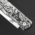 X Тату нож складной Модель X2 "Ведьмин Дом", сталь Aus10Co, рукоять AISI420 с гравировкой X Тату нож складной Модель X2 "Ведьмин Дом", сталь Aus10Co, рукоять AISI420 с гравировкой