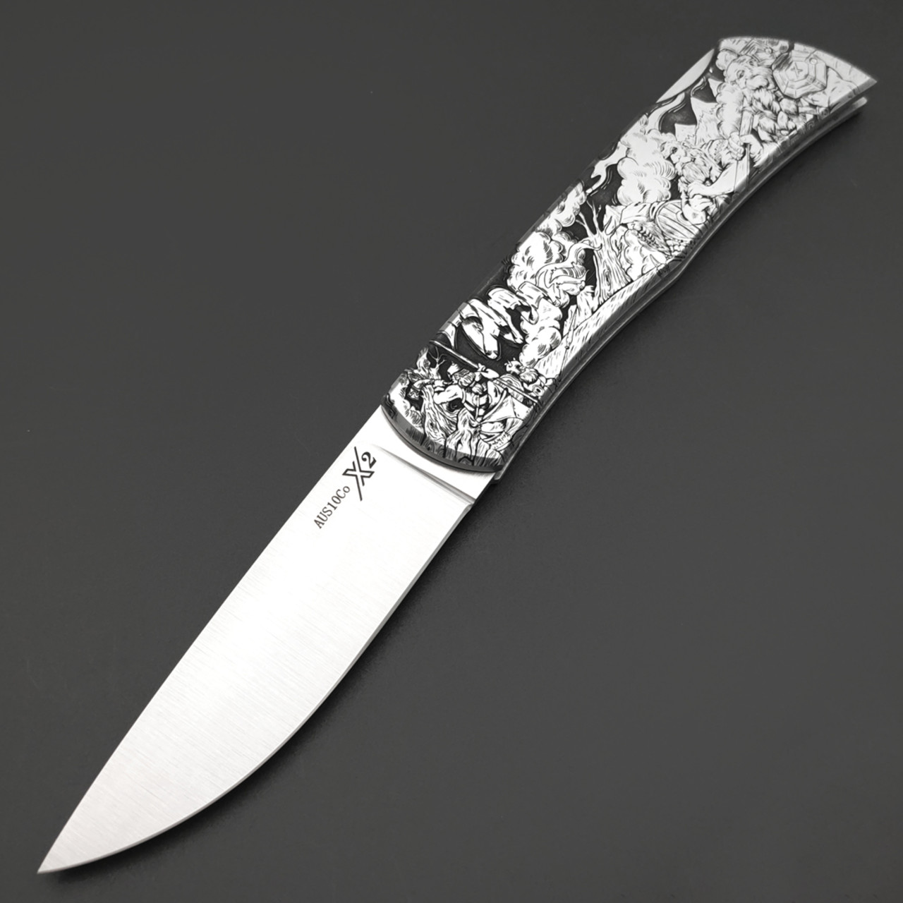 X Тату нож складной Модель X2 "Битва Викингов", сталь Aus10Co, рукоять AISI420 с гравировкой